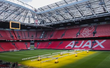 In which league plays Ajax Amsterdam